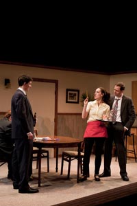 Photo by Paul Gagnon. (L-R): Jared Culverhouse as Frank Ballard (sitting), Jake Silbermann as Johnny Ballard (standing), Beth Wittig as Becky and Malcolm Madera as Ned Ballard.