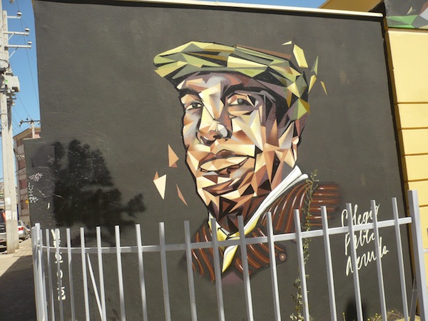 Portrait of Pablo Neruda outside the Neruda Foundation next to La Sebastiana, Valparaiso Chile