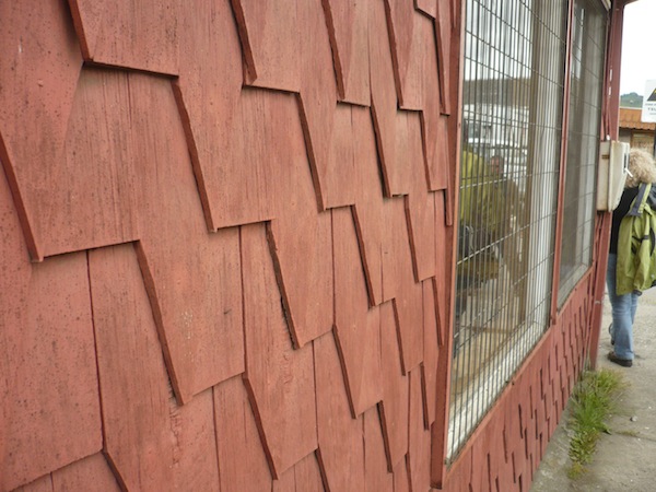 Traditional wooden siding on a house in Castro, Chiloé