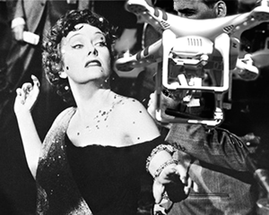 If Norma Desmond were smiling now, it might be for a drone