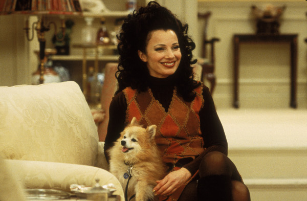 Photo of Fran Drescher as Fran Fine holding Chester the dog in The Nanny