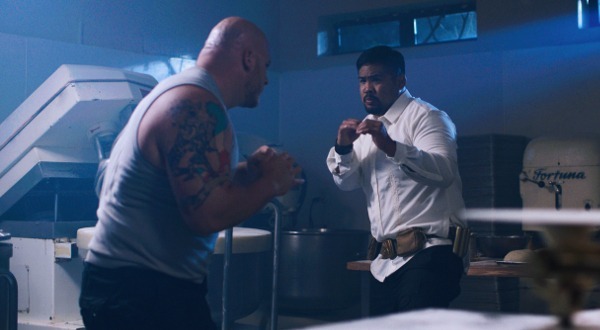 Photo of Mark Muñoz as Kuya fighting Kenny Lorenzetti as Poundcake, ready to throw punches
