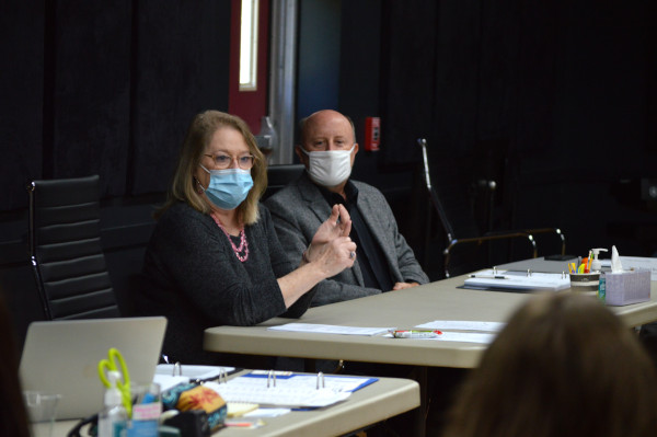 Photo of Bonnie J. Monte speaking to cast at rehearsal