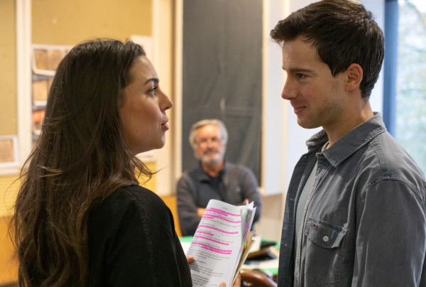Photo of Sophie Levy Khan and Philip Labey gazing at each other during rehearsals for 'While the Sun Shines'