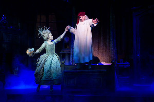 Photo of Jennifer Parsons holding Richard Doyle's hand in 'A Christmas Carol'