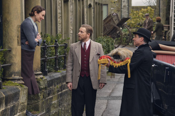 Photo of Anna Madeley and Samuel West standing and talking about Tricki Woo the dog