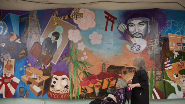 80 Years Later still of Kiyo and Jean visiting the Japanese American Service League