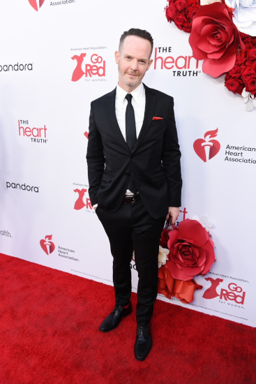Photo of Jason Gray-Stanford standing at a red carpet event