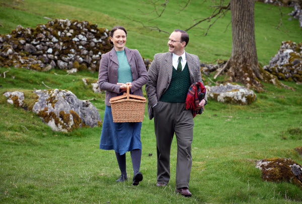 Anna Madeley and Will Thorp taking a walk on the grass of the Yorkshire downs