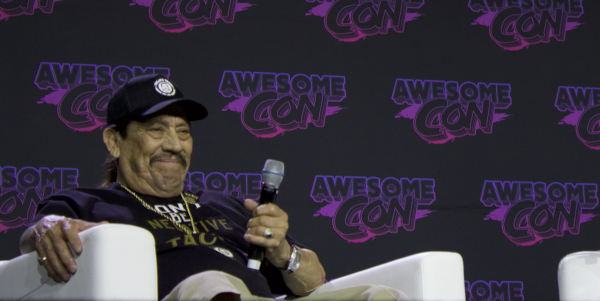 Actor Danny Trejo sitting and smiling