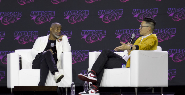 Photo of actor LeVar Burton and moderator Tony B Kim sitting across from each other