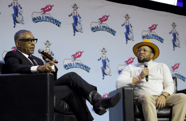 Photo of Giancarlo Esposito and Victor Dandridge on stage with microphones
