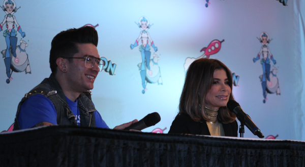 Photo of Paula Abdul at a microphone