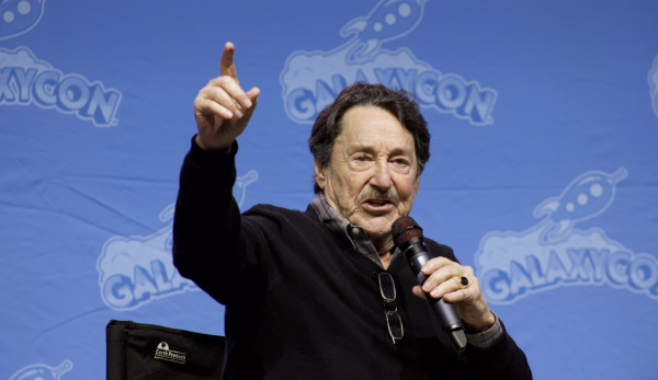 Photo of Peter Cullen gesturing