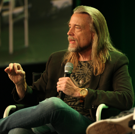 Photo of Steve Whitmire holding a microphone