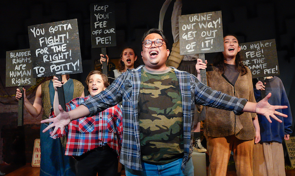 Juan Castro and the company in 'Urinetown' at the Secret Theatre (photo by Steven Speliotis)