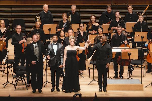 Conductor Kazem Abdullah with soloists and the Lincoln Center Festival Orchestra, July 2024
