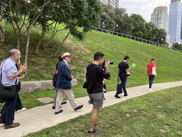 Audience members walk through Riverside Park as part of performance of Huang Rho's 'City of Floating Sounds'