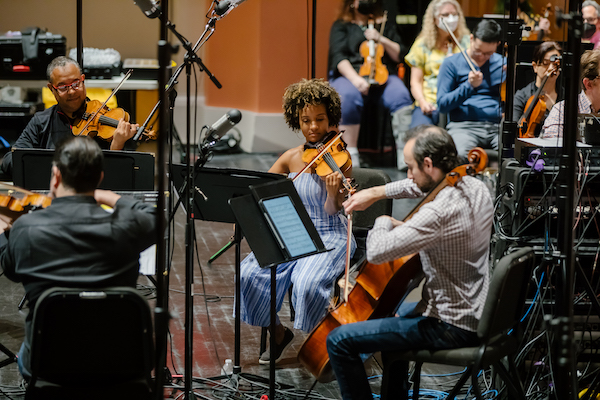 The Charleston Symphony in rehearsal with the Harlem Quartet