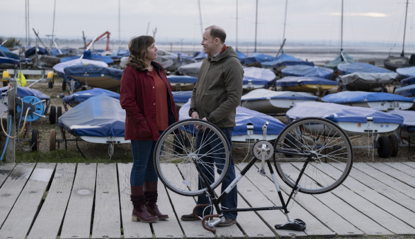 Whitstable Pearl actors Kerry Godliman and Robert Webb standing on a dock