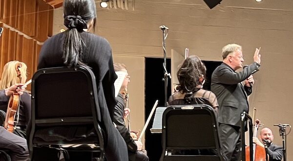Maestro Justin Bischof addresses the audience during Modus Operandi Orchestra's all-Beethoven concert at Merkin Hall, NYC, March 12, 2025 (photo credit: Oren Hope)