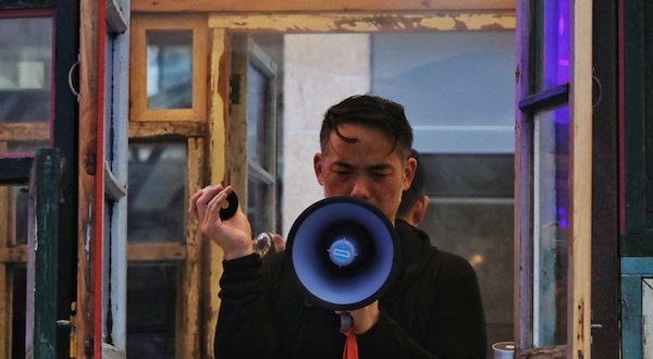 Ken Ueno with megaphone