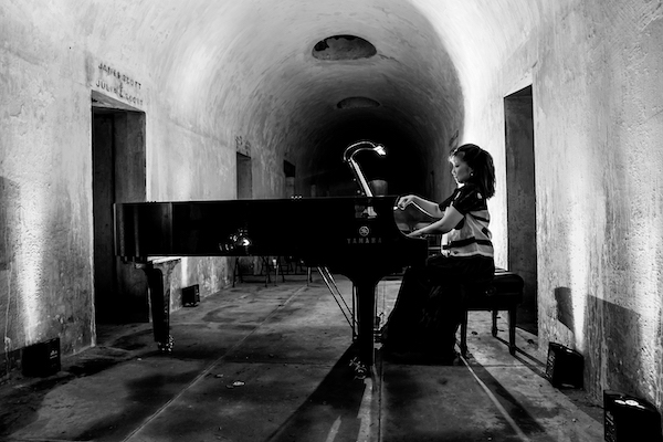 Min Kwon at the Green-Wood Cemetery Catacombs in 2021 (courtesy of Death of Classical)